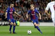 Barcelona's Sergio Busquets and Ivan RakitiÄ